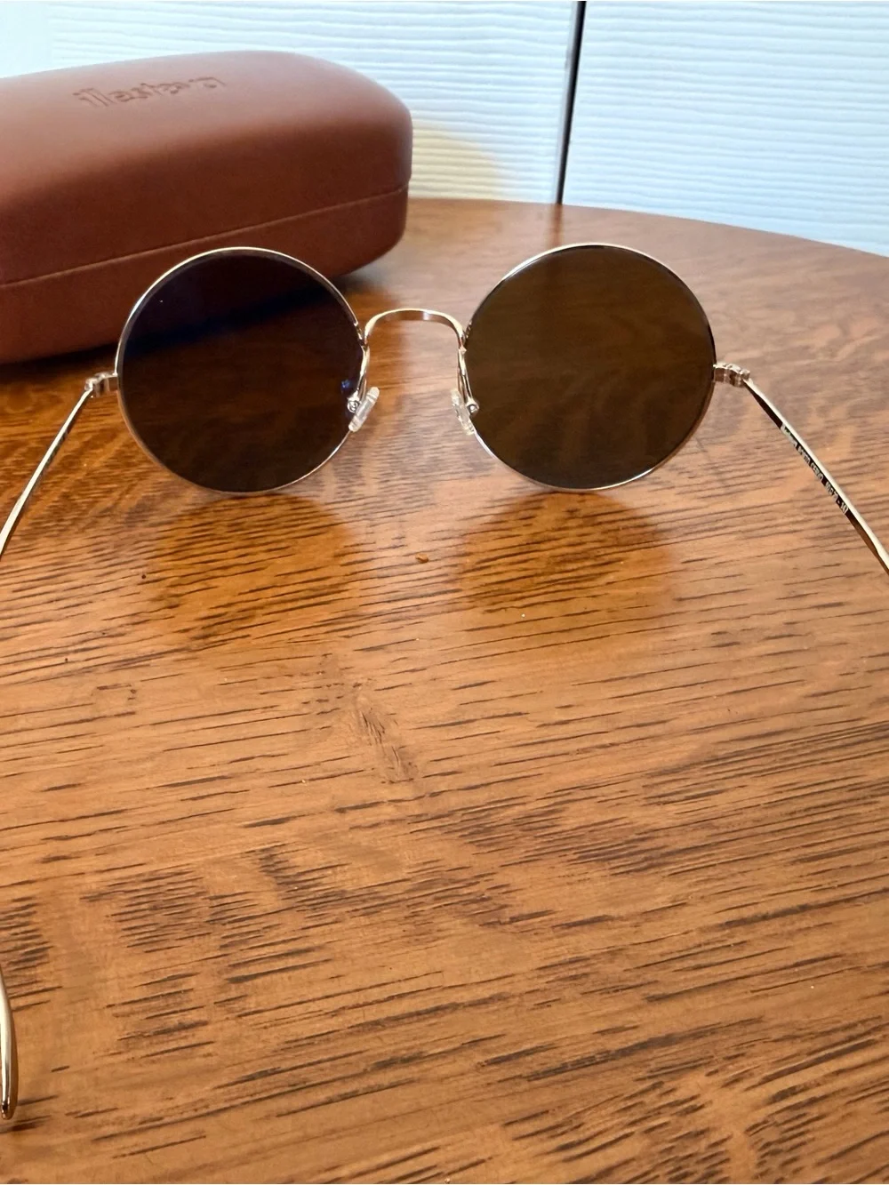 Illesteva Porto Cervo Round Silver Frame Sunglasses with Blue Mirrored Lenses